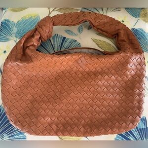 NWOT Urban Expressions Whisky Faux-Leather Woven Hobo Bag. Knot on one side.